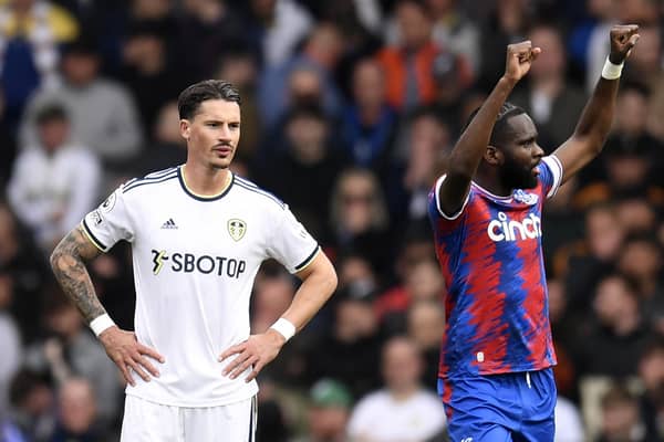 RALLYING CALL: From Leeds United's German defender Robin Koch, left, pictured after Crystal Palace had gone 4-1 up at Elland Road through French striker Odsonne Edouard, right. Photo by OLI SCARFF/AFP via Getty Images.
