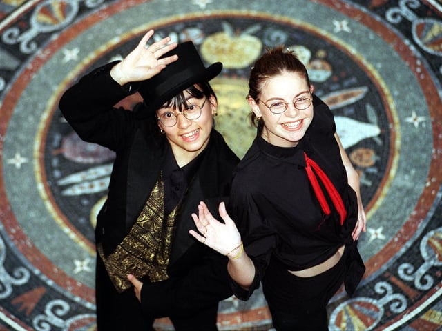 Leannne Nguyen, left, and Simone Taylor of St Michael's College in Burley, were among a 20 strong group to perform a 20 minute mix of dance, mime and drama in the Victoria Quarter in the city centre. Pictured in September 1999.