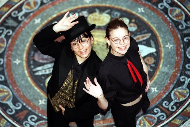 Leannne Nguyen, left, and Simone Taylor of St Michael's College in Burley, were among a 20 strong group to perform a 20 minute mix of dance, mime and drama in the Victoria Quarter in the city centre. Pictured in September 1999.