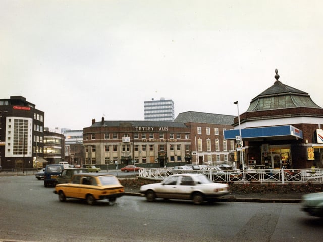 Eastgate roundabout from the direction of St. Peter's Street in March 1983. Circle House is on the left and the Marquis of Granby public house in the centre. A petrol filling station occupies the centre of the roundabout.