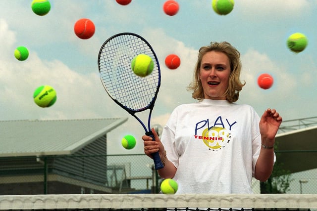 YTV weather girl Debbie Lindley takes evasive action at the launch of Play Tennis 98 at South Leeds Tennis Centre in Middleton in May 1998.