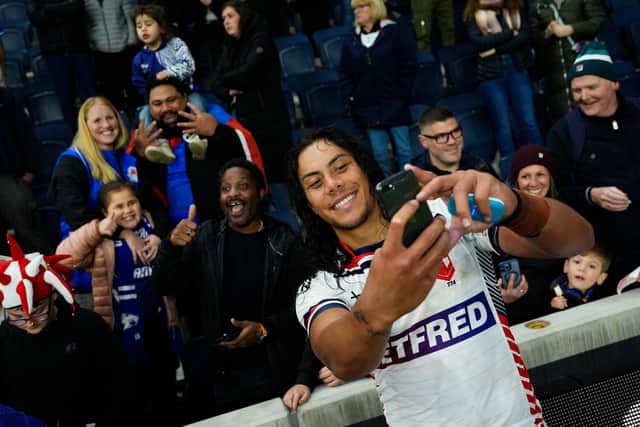 Samoa may have lost Saturday's Test, but their NRL superstar Jarome Luai - in a swapped England shirt - enjoyed meeting fans at AMT Headingley afterwards. Picture by Olly Hassell/SWpix.com.