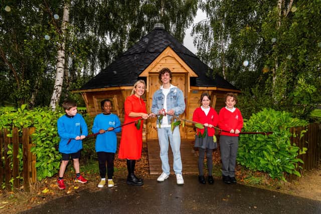 Up-and-coming pop star Nath Brooks opened the new sensory facility at Allerton CofE Primary School, in Lingfield Approach, Leeds, with students Luca and Elinoy, headteacher Helen Stott, and students Kaira and Bobby. Photo: James Hardisty.