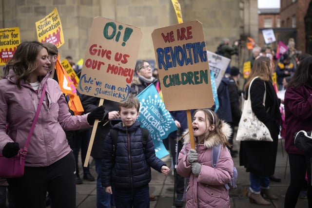 A number of children joined their parents outside Leeds Art Gallery in a show of support for the striking teachers.