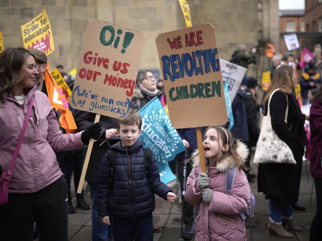 A number of children joined their parents outside Leeds Art Gallery in a show of support for the striking teachers.
