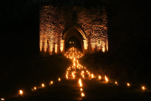 And one of the many show stopping installations doesn't even depend on electricity - the fire garden, featuring dozens of real-flame torches, majestically light up castle ruins.