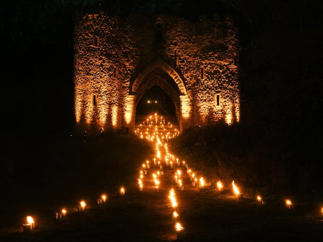 And one of the many show stopping installations doesn't even depend on electricity - the fire garden, featuring dozens of real-flame torches, majestically light up castle ruins.