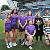 Denise McCardle, centre, with the Varsity trophy that will be fought over by Leeds Beckett Universit
