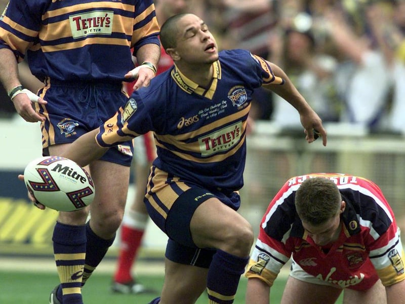 Marcus St Hilaire celebrates after scoring for Rhinos.
