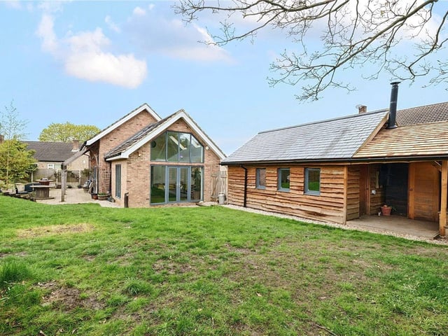 Externally to the front of the property there is a driveway, providing ample off street parking, and leading to a versatile, fully insulated garage/workshop which could be used in a variety of different ways.