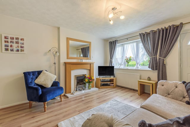 The property offers generous accommodation throughout and the sitting room benefits from a fireplace and gorgeous window letting in natural light.