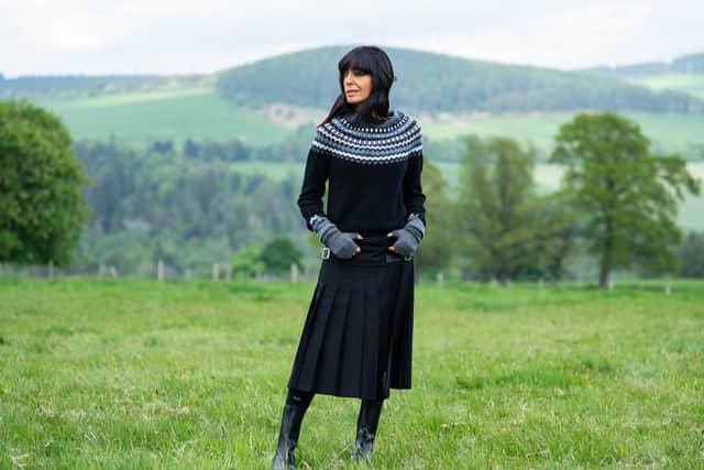 The Traitors III Claudia Winkleman rocks kilt @lekilt, knit @brorafashion and boots @newbottega - picture: BBC ,Studio Lambert, Euan Cherry