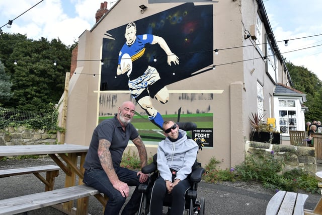 The Rob Burrow mural at the Bay Horse, in Meanwood, is popular with Leeds Rhinos fans - and those inspired by its namesake's empowering story. Pub regular Richard Sheridan, pictured here with Rob, first had the idea for the mural. It was painted by artist 'Chris'.