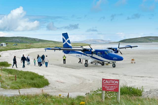 Barra's beach runway hosts some 13,000 passengers a year