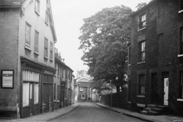 An evening view of Church Lane in Chapel Allerton in May 1963. A map of 1781 shows that the Turnpike Road from Leeds to Harrogate and Knaresborough initially followed Church Lane, although by 1812 it was routed on the Harrogate Road, as we know it today.