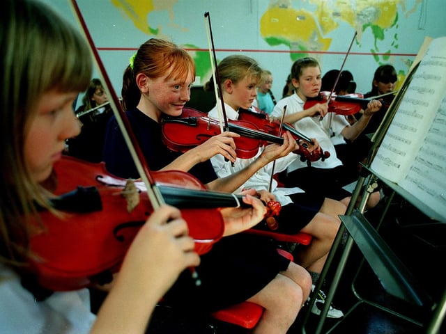 Four members of the orchestra at Ninelands Lane Primary School in Septwember 1997. Pictured, from left, are Kirsty Winter, Lisa Llewellyn, Laura Pritchard and Eleanor Leatham.
