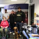 Amanda Davidson and her support dog Chris with members of Sheffield Sabres (left to right) Will Robertson, Tosin Akintola, Henry Veary, Thomas Glover and Danny Mullick.