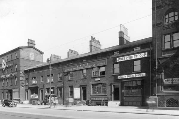 Wellington Street in August 1937. From the left, is no.72 James Hare woollen warehouse, no.68A Ellis Noble, barber also newsagents kiosk. London and North Eastern Railway Office (LNER) occupies centre of block, no.64. John Allix was office manager. No.62, business of Henry Warner suitcase maker. James P Sherwood yeast supplier was at no.60. These properties still exist.
