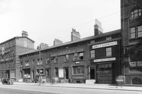 Wellington Street in August 1937. From the left, is no.72 James Hare woollen warehouse, no.68A Ellis Noble, barber also newsagents kiosk. London and North Eastern Railway Office (LNER) occupies centre of block, no.64. John Allix was office manager. No.62, business of Henry Warner suitcase maker. James P Sherwood yeast supplier was at no.60. These properties still exist.