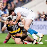 York Knights' Mitch Clark is tackled by Mathieu Jussaume and Joe Bretherton, of Toulouse Olympique, during last year's Betfred Championship Grand Final. Picture by Allan McKenzie/SWpix.com.