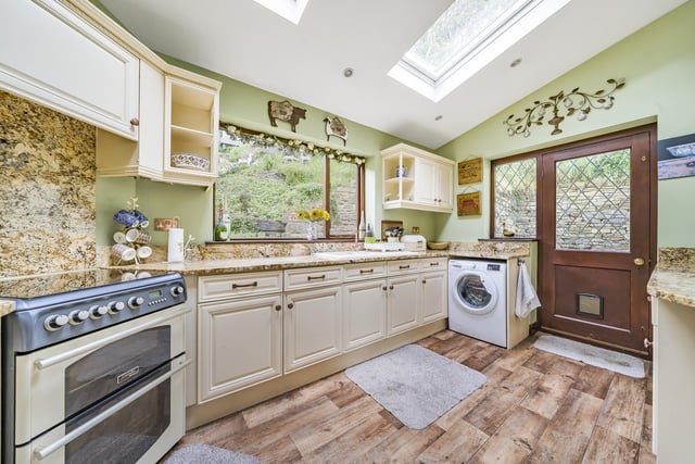 The kitchen is an extended room at the rear of the ground floor and is a bright, well-thought-out space with ample storage space, high-spec granite worktops and an integrated fridge-freezer. Picture: Linley and Simpson.