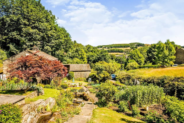 Beautiful countryside surrounds Swamp Cottage and its gardens.