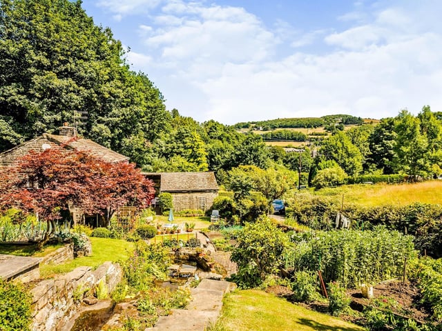 Beautiful countryside surrounds Swamp Cottage and its gardens.