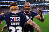 Maika Sivo and Danny Levi celebrate Leeds Rhinos' 58-6 victory over Hull KR in Las Vegas. Picture by Alex Whitehead/SWpix.com.