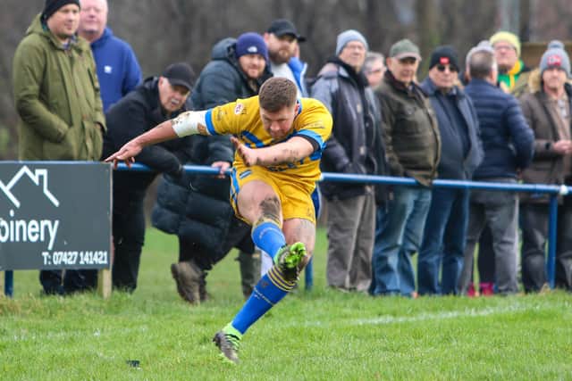 Jordan Gale boots a conversion for Hunslet ARLFC in their Challenge Cup third round win at Lock Lane. Picture by Alex Shenton.