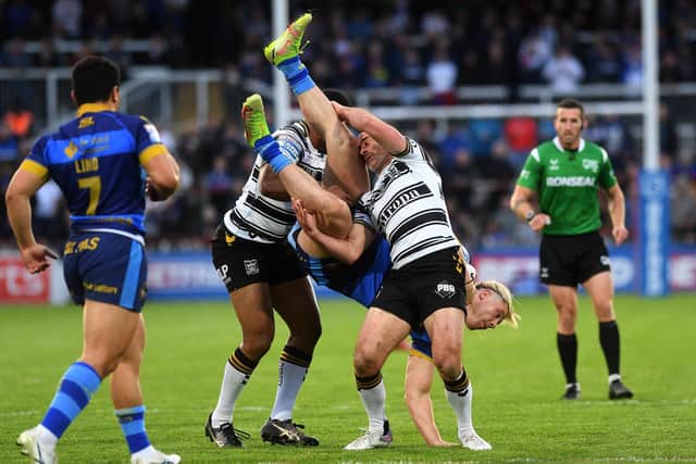 Tom Lineham is dumped by Danny Houghton. (Picture: Jonathan Gawthorpe)