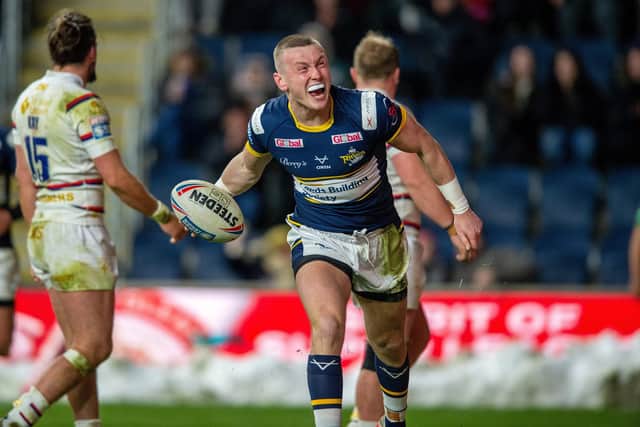 Harry Newman celebrates his comeback try for Rhinos against Wakefield. Picture by Bruce Rollinson.
