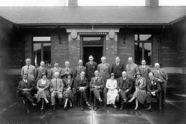 Group portrait of Knostrop Sewerage Committee pictured in July 1932 with four lady members. In photographs taken from the 1920s, long serving members of the committee can be recognized.