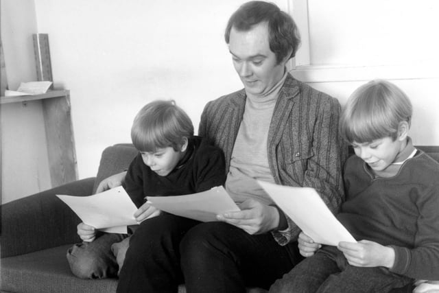 February 1969 and playwright Alan Ayckbourn is photographed with his sons Philip and Steven. At this time he was drama producer for BBC North Region at Leeds.