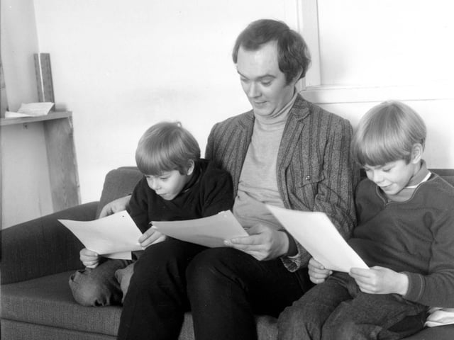 February 1969 and playwright Alan Ayckbourn is photographed with his sons Philip and Steven. At this time he was drama producer for BBC North Region at Leeds.