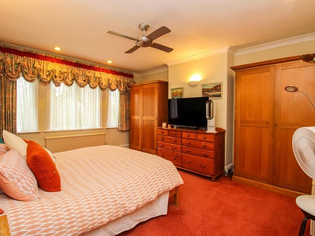 To the first floor, the galleried landing gives way to four generous double bedrooms.