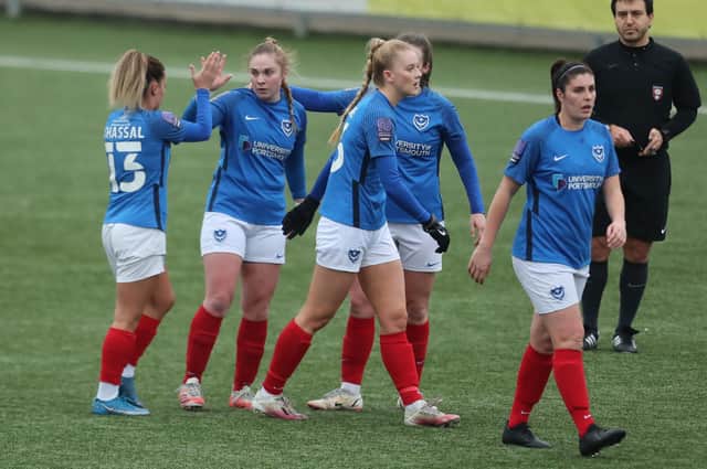 Pompey Women come together to celebrate Tamsin De Bunsen, second left, breaking the deadlock with a stunner against Moneyfields Picture: Dave Haines