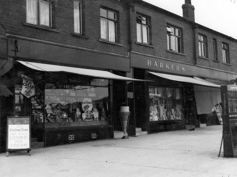 Shops on Ring Road Beeston Park, close to the junction with Dewsbury Road in June 1937.On the left is William Pattinson, confectioner, with George Barker, draper, on the right.
