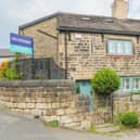 This beautiful stone-built cottage, located in the heart of Calverley village is on the market for £310,000.