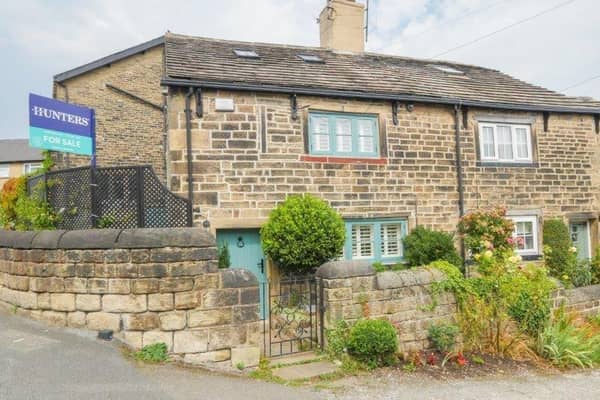 This beautiful stone-built cottage, located in the heart of Calverley village is on the market for £310,000.