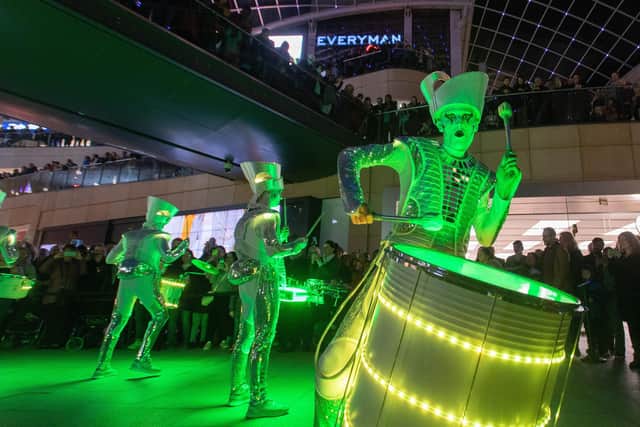 Performers at last year's edition of the Light Night Leeds festival in the Trinity shopping centre. Photo: Bruce Rollinson.
