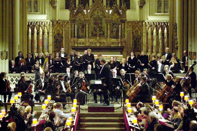 Leeds Parish Church, the setting for a Gala Concert of French music.  The Chorus of Opera North and the English National Philharmonia conducted by Philip Sunderland came together for the concert, which was the  first time that Opera North had performed at the church since it was formed.  Pictured is Philip Sunderland at the rostrum with members of the Chorus and the Philharmonia taken from the West Gallery, on January 31, 2001.