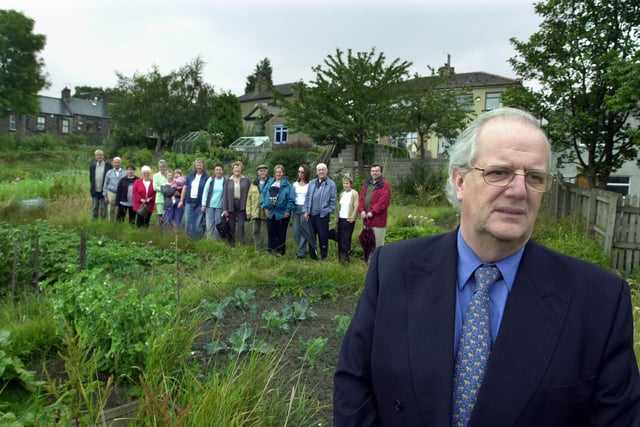 Coun Andrew Carter, front, pictured  on an allotment off  Crowther Avenue with angry residents who are campaigning to stop the site being redeveloped in July 2002.