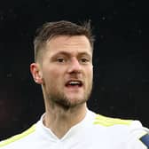 LEEDS, ENGLAND - OCTOBER 02: Liam Cooper of Leeds in action during the Premier League match between Leeds United and Watford at Elland Road on October 02, 2021 in Leeds, England. (Photo by Jan Kruger/Getty Images)