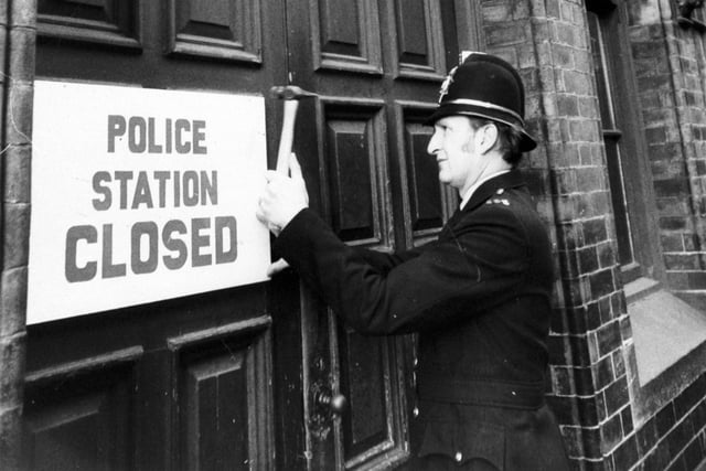 A sign is nailed to the door of the old Millgarth Police Station after the building closed in January 1976.