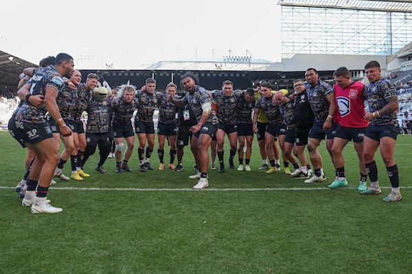 Hull FC players celebrate their shock win over Warrington Wolves in the final game of Magic Weekend.