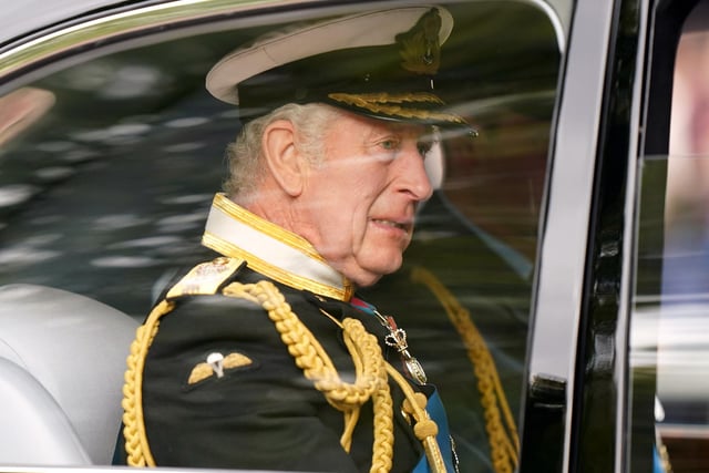 Crowds cheered and clapped as the King was driven into New Palace Yard ahead of the removal of the Queen’s coffin from Westminster Hall