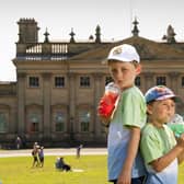 The Great British Food Festival returns to Harewood House this Bank Holiday weekend. Pictured is Leo Porritt aged 7 with his brother Jacob aged 4, from Mirfield, cooling down with a frozen Lemonade at the festival. Photo: Simon Hulme