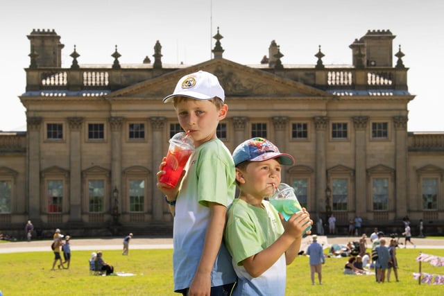 The Great British Food Festival returns to Harewood House this Bank Holiday weekend. Pictured is Leo Porritt aged 7 with his brother Jacob aged 4, from Mirfield, cooling down with a frozen Lemonade at the festival. Photo: Simon Hulme