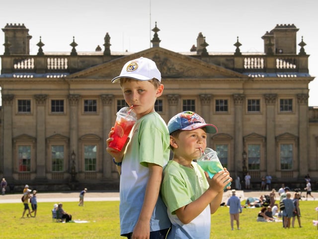 The Great British Food Festival returns to Harewood House this Bank Holiday weekend. Pictured is Leo Porritt aged 7 with his brother Jacob aged 4, from Mirfield, cooling down with a frozen Lemonade at the festival. Photo: Simon Hulme