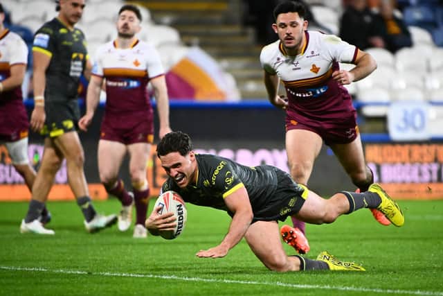 Brodie Croft seen scoring one of his four tries during Leeds Rhinos' big win at Huddersfield Giants a month ago. Picture by Olly Hassell/SWpix.com.